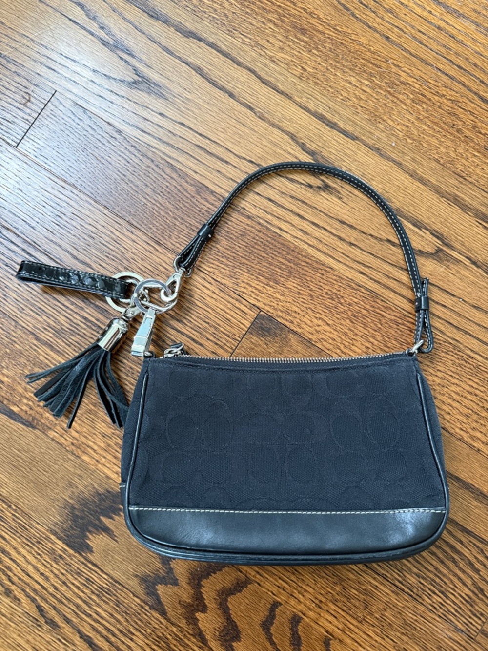 B40 Coach Women’s Black Canvas Signature Wristlet with Tassel Charm